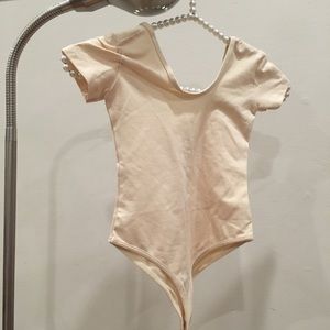 American Apparel kids leotard in peach color.